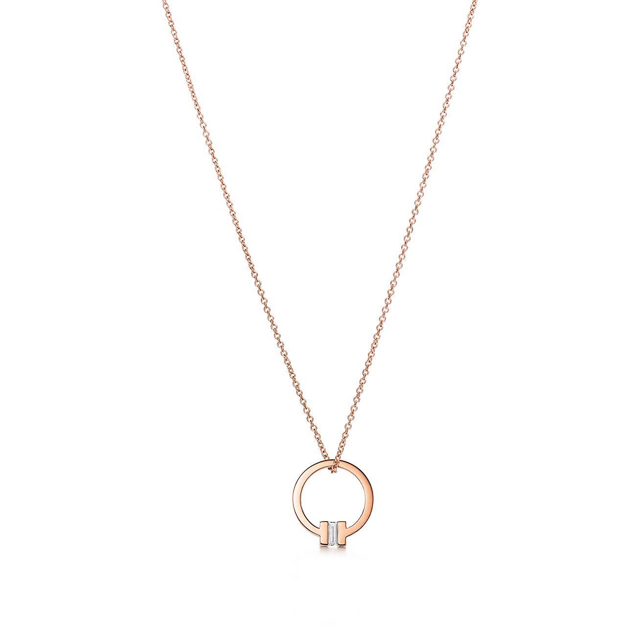 TIFFANY T PENDANT IN 18K ROSE GOLD WITH A BAGUETTE DIAMOND